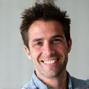 Profile picture of Mark Rivera, a man smiling.